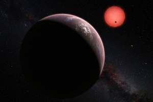 This artist’s rendering shows an imagined view of the three planets orbiting an ultracool dwarf star just 40 light-years from Earth that were discovered using the TRAPPIST telescope at ESO’s La Silla Observatory. In this view, one of the inner planets is seen in transit across the disc of its tiny and dim parent star. Image: M. Kornmesser/ESO