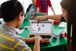 Kids work on a project during Scratch Day at MIT Media Lab