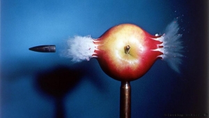 Photo of bullet piercing an apple titled "How to Make Applesauce at MIT."