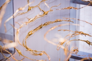 "Schwerpunkt, a suspended anamorphic neuron sculpture by Ralph Helmick" at MIT’s McGovern Institute. Image: Caitlin Cunningham