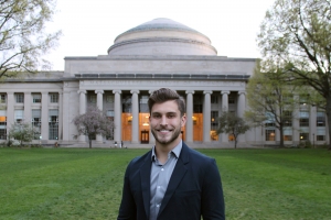 Liam Ackerman stands in front of the MIT Great Dome on Killian Court. Image: Courtesy of Liam Ackerman