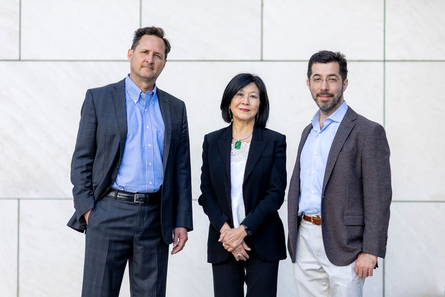 Philanthropist Lisa Yang (center) with Hugh Herr, professor of media arts and sciences at the MIT Media Lab (left) and Ed Boyden, the Y. Eva Tan Professor in Neurotechnology at MIT (right).