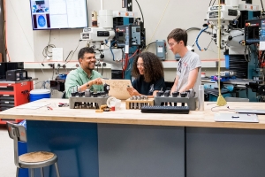 MIT Maker Czar and mechanical engineering professor Martin Culpepper works with students