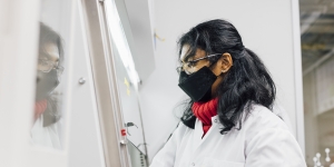 MIT researcher working in the biolab