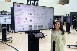 Alejandra Rosario presents her research at the 2022 MSRP-Bio poster session.