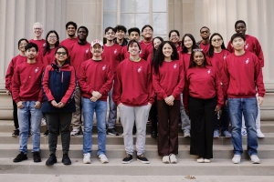 Caption:Some of the students who attended the recent FLI Week of Celebration events gathered for a group photo in their red FLI sweatshirts, designed to build greater awareness of the first-generation and/or low-income identities.