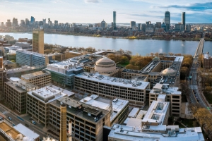 A morning, aerial view of MIT campus looking over into Boston.
